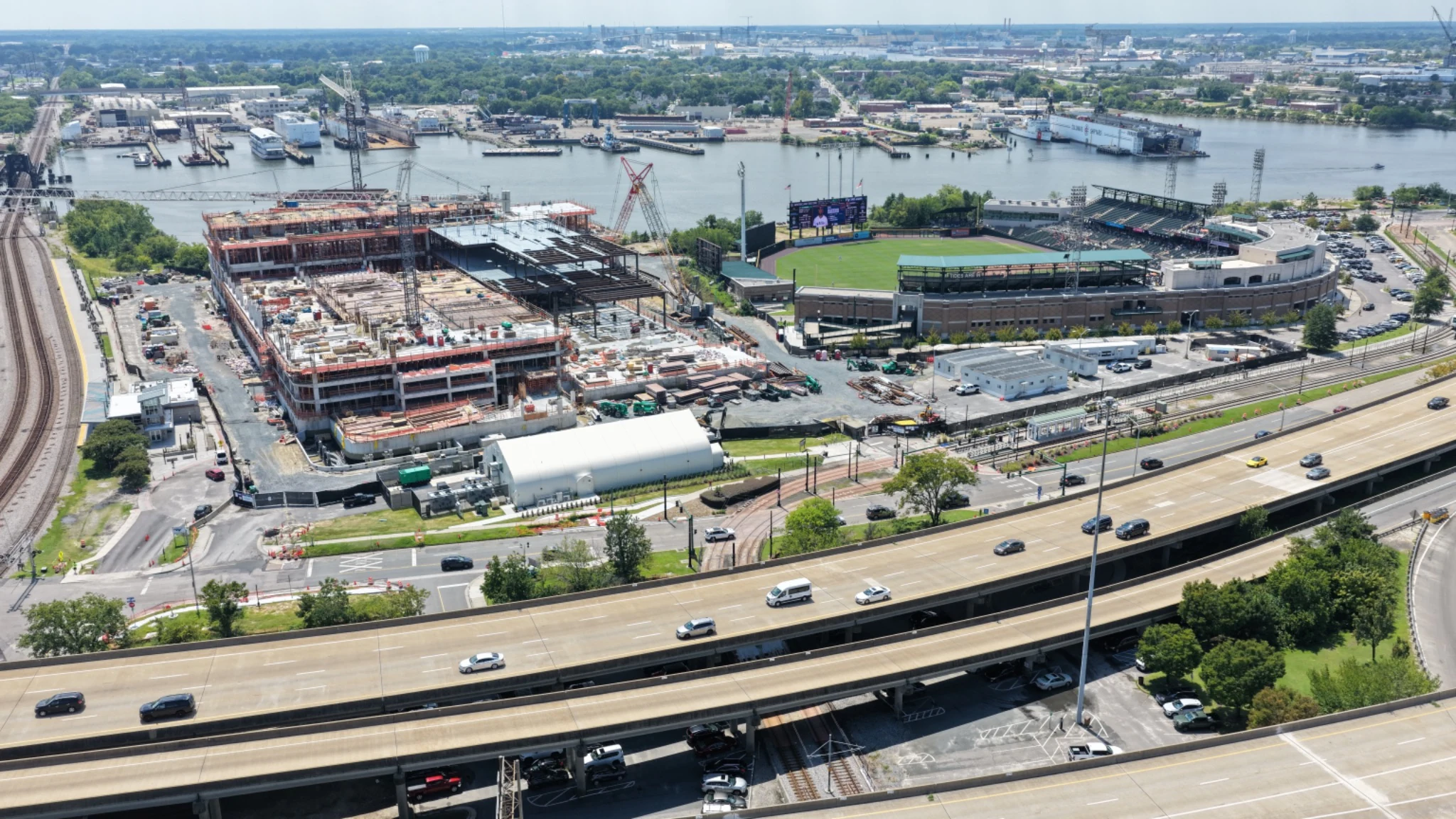 Norfolk casino resort construction beside Harbor Park and waterfront infrastructure