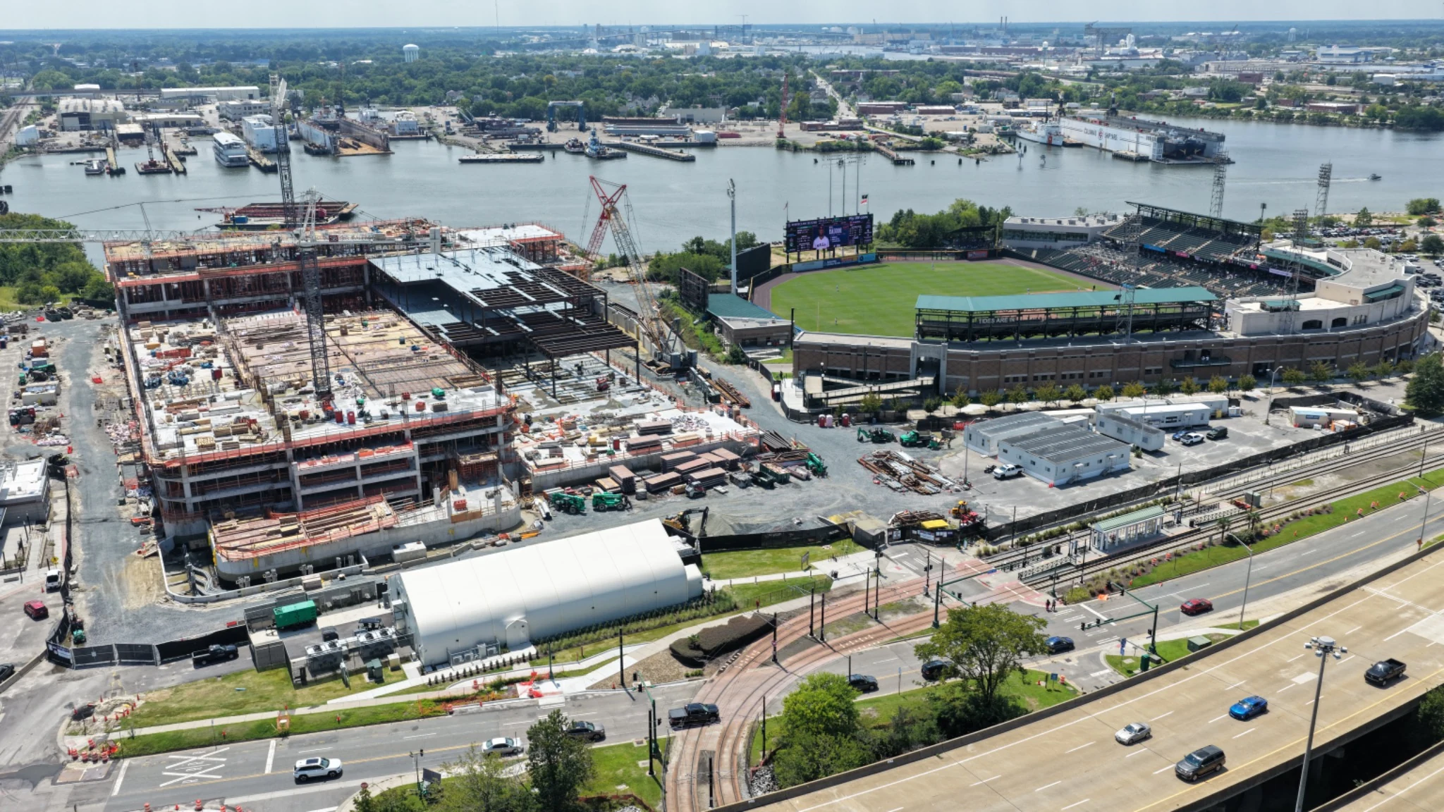 Norfolk casino construction with Harbor Park and industrial waterfront