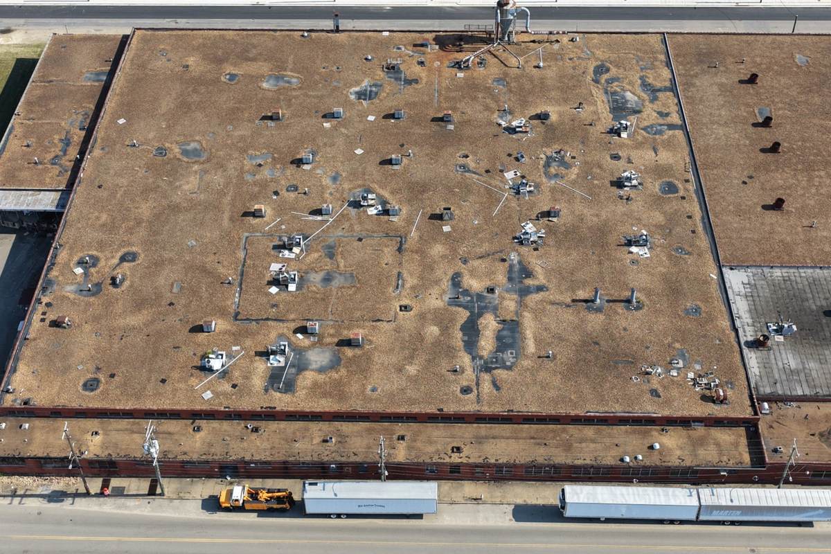 Aerial roof documentation and commercial building site condition imagery for owner records
